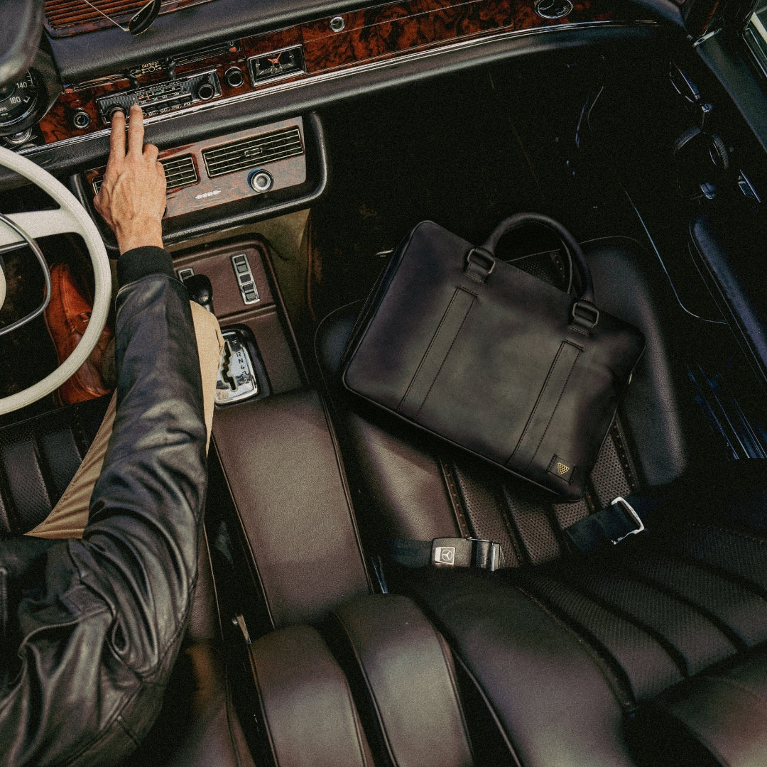BuffaloJacksonTradingCompany_JackAndrews_JeffersonBriefcase_Black_VintageCar_Top_Square_2000x